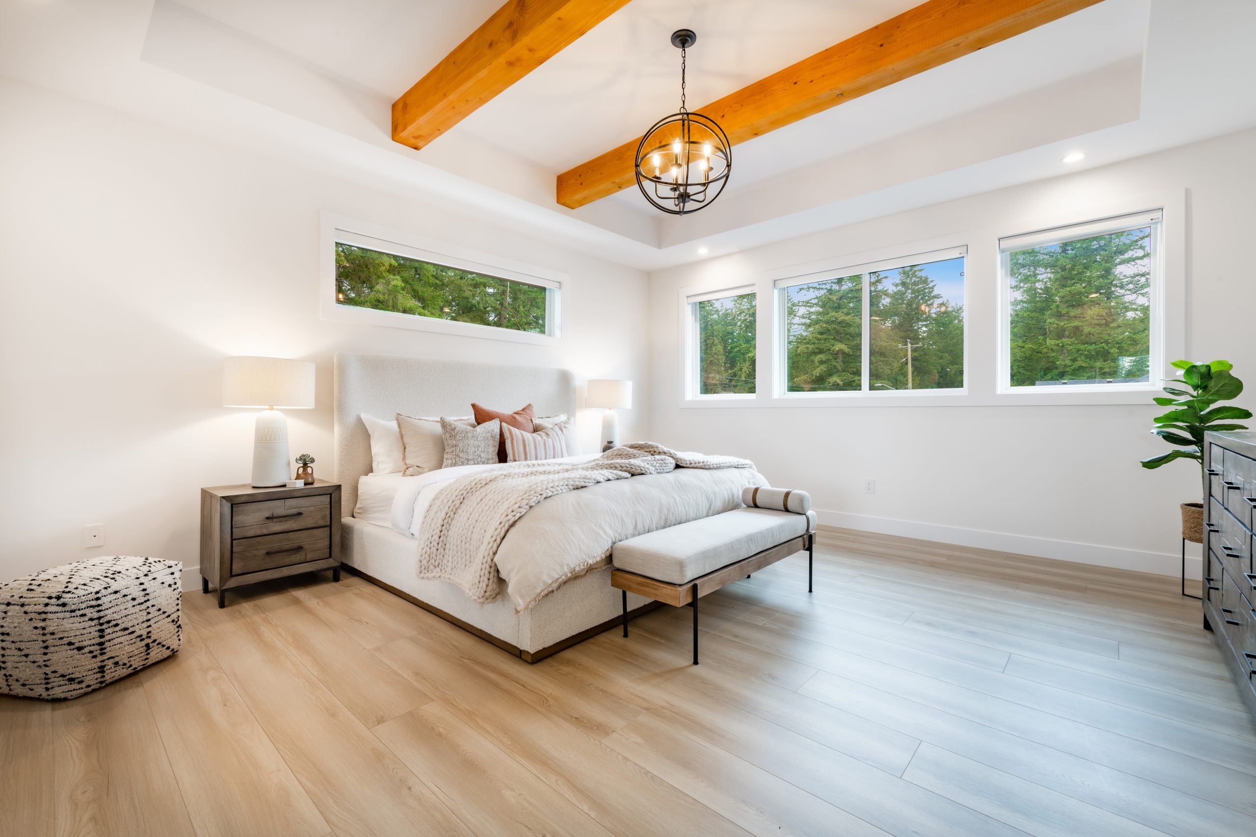 Primary,Master,Bedroom,With,Wood,Beam,Ceiling,Hardwood,Floors,White